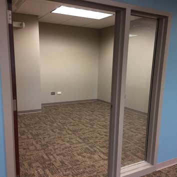 Credit Law Two story office building renovation located in Lee's Summit, Missouri. A portion of the floor was removed to allow the installation of an 