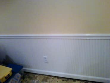 remediation/rebuild/ (restoration project) removed existing flooring...Removed weinscot and all moldings/sheetrock/water-back up system. new weinscot
