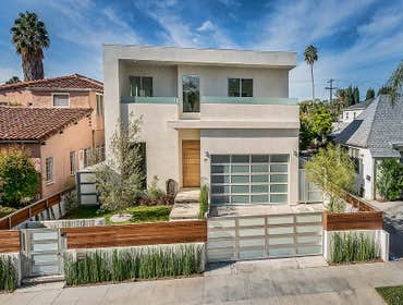 Modern Architectural Masterpiece This 5-bed, 5.5-bath home spans 4,000 sqft. Natural light floods through glass walls and skylights. Open floor plan, h