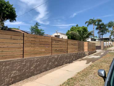 Masonry and wood fence