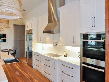 Photos by Meltini Kitchen & Bath Designs #1