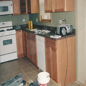 Kitchen This is a remodeled kitchen in 2005. The floor was made of ceramic tiles. The design was created by the owner and we helped make that dream...