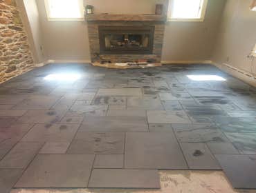 Black slate flooring in office
