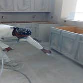 Spraying kitchen cabinets
