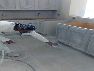 Spraying kitchen cabinets