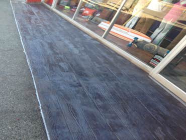 Wood plank concrete overlay