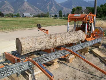 Sawmill and custom wood Sawmill owned and operated by Murphy Construction Design. Custom cut wood to clients specifications.