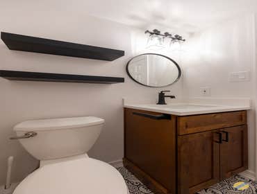 Black and White Bathroom Get ready to fall in love with black-and-white bathroom that packs a punch! The dramatic black fixtures are the stars of this 