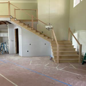 Photos by Cusolito Property Solutions #2 Staircase relocation. We remodeled the entire interior of the home.