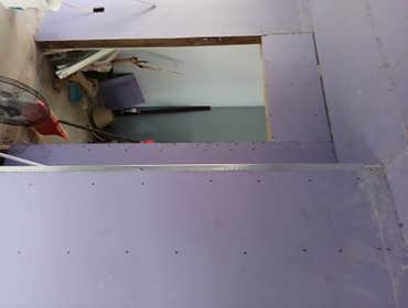 Photos by JBC Construction and Landscaping LLC #3 Kitchen demo refrigerator built into recessing wall no finish work all demo drywall spackle..
