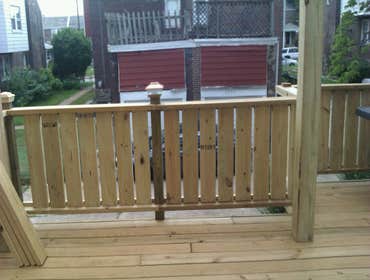 Photo(s) from Laur Moor Construction Two decks and a tiled kitchen floor