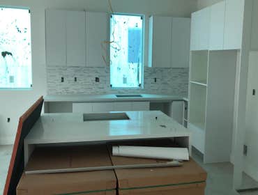 KITCHEN/COUNTERTOP RENOVATION Complete Cabinetry Installation and new Countertop Installation. Backsplash included.