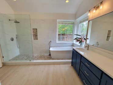 Photos by Trublue of Allen #35 Full master Bathroom remodeling. New bigger shower, vanities, painting, flooring, lighting, frameless glass panel
