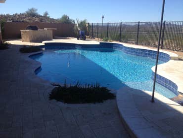 Reverse negative edge Travertine deck, spa, reverse negative edge play pool,