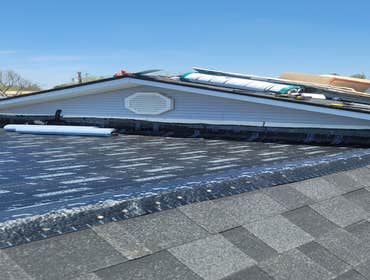 Photos by Synergy Roofing and Solar
