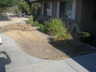 Artificial Turf Installation Before and after pictures for a synthetic turf system.
