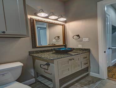 French Country Custom home on a treed property in Maypearl Texas. Gted community
