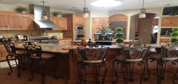 Corrales Home Granite Countertops, 3cm Juperana Colombo Gold in the kitchen.