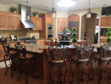 Corrales Home Granite Countertops, 3cm Juperana Colombo Gold in the kitchen.