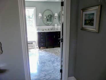 2008: Bright & Elegant Classic Master Bath The master bath was enlarged by integrating space form the original bedroom closet area. A new larger closet