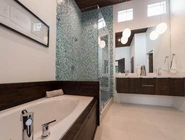 Photos by Monkey Wrench plumbing, Heating & Air #1 Complete remodel of mid-century modern home. Also added a half bath on main level as well as a secon