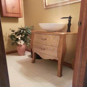 John Powers Plumbing Project Powder room custom vanity. Replaced a basic Pedestal sink.