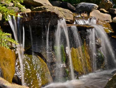 Scarsdale Waterfall by MG's Lawn Green Inc This is a waterfall that MG's Lawn Green designed and installed for a homeowner in Scarsdale, NY.