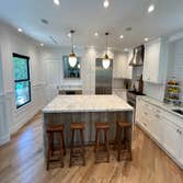 Encino 10 Foot Island New 10ft x 6ft Island, Stone Fabrication, New Custom Cabinets, & New Luxury Vinyl Bathroom Floor