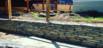 Retaining stone wall.