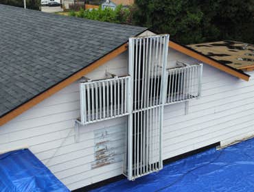 Isaac Roof Construction Commercial Roof Project Flat roof replacement with a minimum R-value of R-30 and a Class A Fire rating.