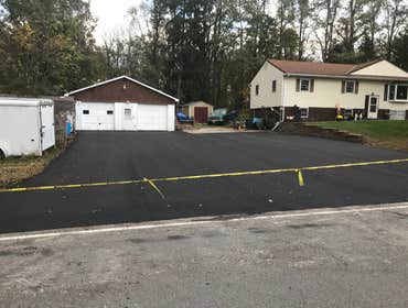 Photos by Hv Construction Services Inc #1 Drainage and new blacktop driveway, parking area.