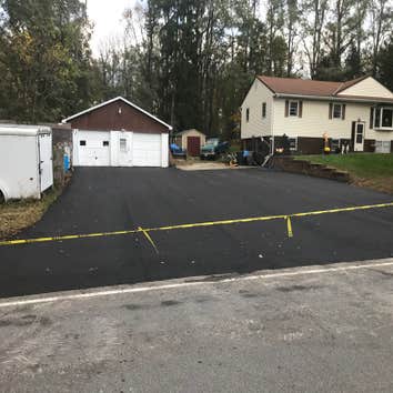 Photos by Hv Construction Services Inc #1 Drainage and new blacktop driveway, parking area.