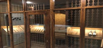 Wood st wine room Clear alder wood with dark walnut stain. Insulated glass with foam insulated walls, led lights, 560 bottle capacity
