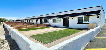 GLENDALE EXTERIOR RENOVATIONS Complete exterior renovation of an apartment complex, including exterior paint, metal roof replacement, and common area i