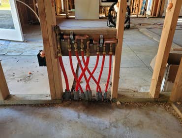 Photos by Top of the West Plumbing #2 5 bathroom, 2 kitchen, 2 laundry rooms. Hydronic floor heating throughout.