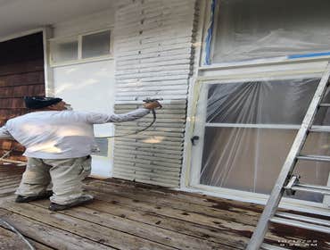 Saul's Quality Painting LLC Project #1 Initially Just a repainting of the home, later the client asked to add the painting of the deck to the job agree
