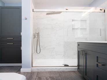 Berkeley Hill Bathroom Remodel Complete bathroom remodel. Shower has full length granite slabs.