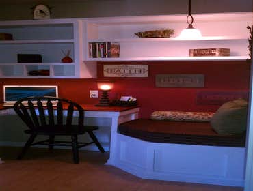 Closet becomes office Interior renovation of a spare closet to home office. All cabinetry was custom built to fit the space. No "assembly required" d