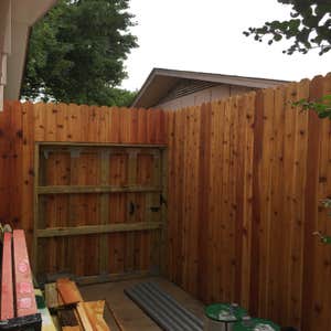 8' Cedar Fence with 10' steel poles