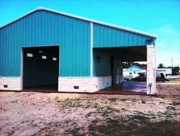 Barndominium This is a beautiful 30x60 with a 15x60 covered patio. Stained floors inside and out. Has 1 bedroom and 2 bathrooms downstairs with a kitc