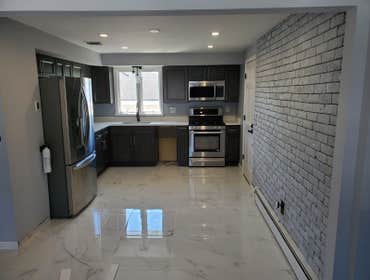 Kitchen Renovation "Transform your kitchen into a culinary masterpiece with our professional installation services."