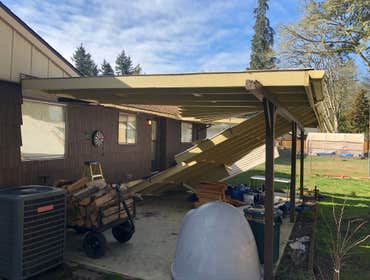 Photos by Dudley Const & Remodel LLC #1 Snow collapsed old awning on the back porch. Built brand new awning with clear, corrugated, plastic and new gut