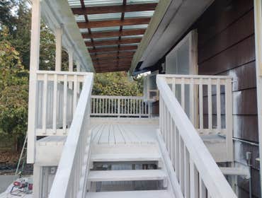 Saul's Quality Painting LLC Project #1 Initially Just a repainting of the home, later the client asked to add the painting of the deck to the job agree