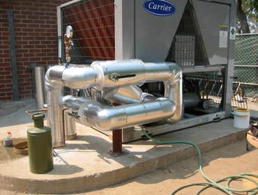 Project photos from Consolidated Mechanical Air Conditioning & Heating Inc Calstate Long Beach , installation of two Carrier Chillers