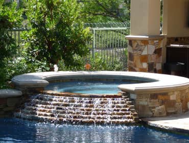 Spa with cascade spillway.