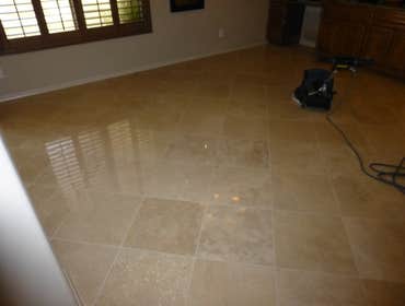 Travertine Clean/Polish/Color Seal This floor was dirty and dull. We decided to attack it with a general cleaning followed by a three step polish and f