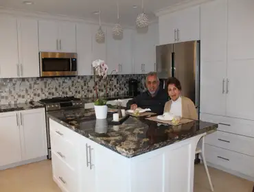 Photos by U.S. Accurate Construction Kitchen remodeling including structural walls removal