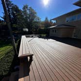 Photos by Vertex Decks LLC #1 Another beautiful project features TimberTech composite decking with a picture frame perimeter, including steps. The addi