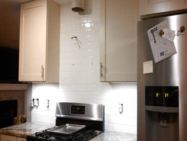 Vail Rd. Kitchen Backslash A delightful subway tile installed in the Kitchen.