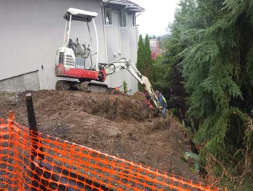 Newcastle Foundation Addition Land clearing, concrete removal, fence removal, foundation excavation
